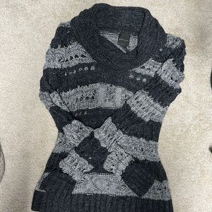 Girls large DKNY - Fits a women’s. Small easily as I have loved this sweater.